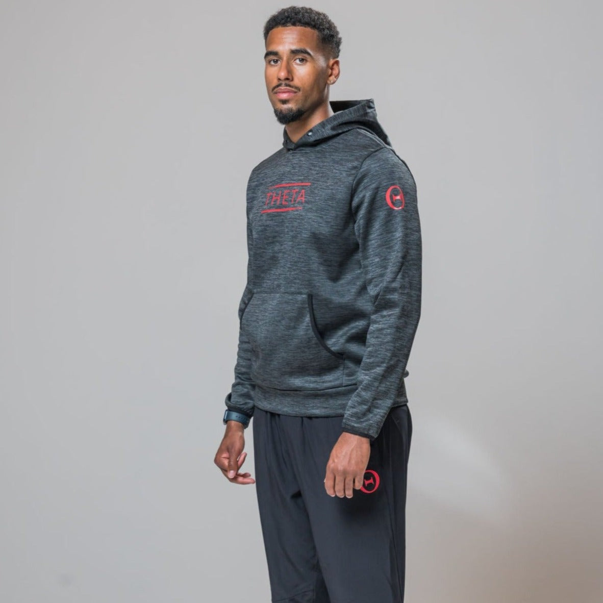 Complete look of our THETA thermo hoodie and THETA core trackies. Finished with red nike metcon 8's.