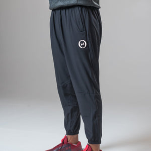 THETA core gym wear trackies. These trackies are made for functional fitness and general gym wear use. Featuring a side on view of our white THETA logo.
