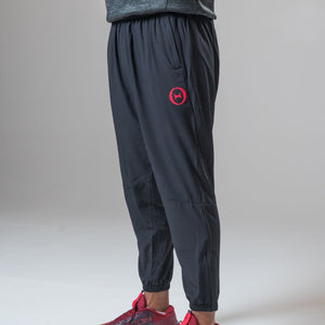 THETA core gym wear trackies. These trackies are made for functional fitness and general gym wear use. Featuring a side on view of our red THETA logo.