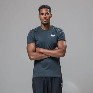 Front view of our THETA element t-shirt. This top was made for athleisure wear and functional fitness. Paired with our white logo core trackies. 