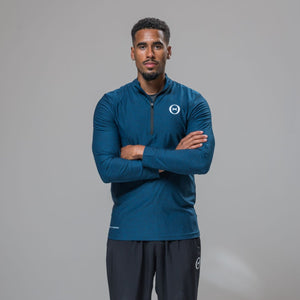 Front view of our THETA element 1/4 zip. This 1/4 zip was made for athleisure wear and functional fitness. Paired with our white logo core trackies. 